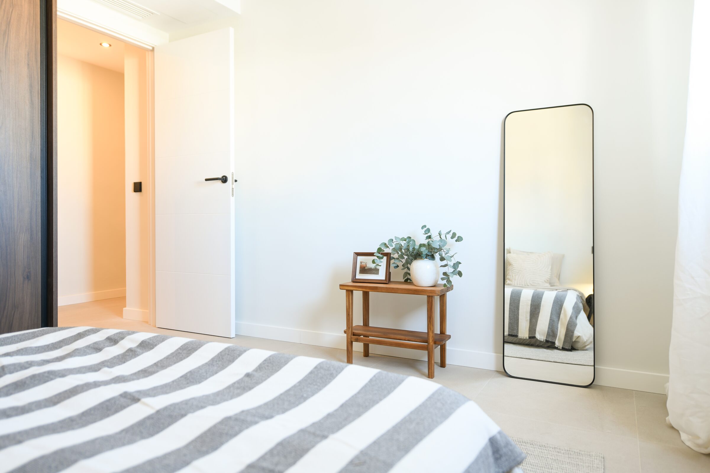Private terrace with views over the rooftops of Palma toward the Serra de Tramuntana.